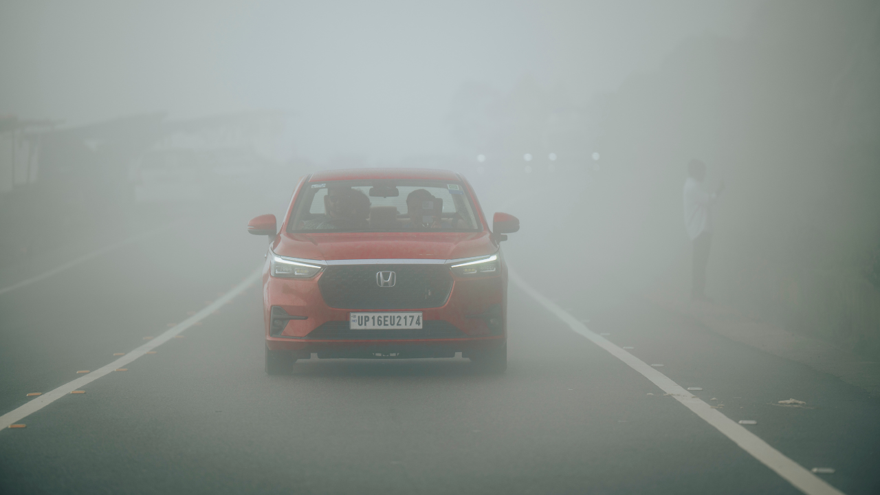 As we ascended the winding ghats, thick fog and light rain sharply reduced visibility